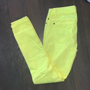 Neon yellow skinny pants